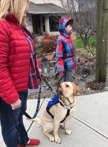 Kye with Autism Service Dog Corky